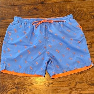 Blue Swim Shorts with Orange Palm Tree print.